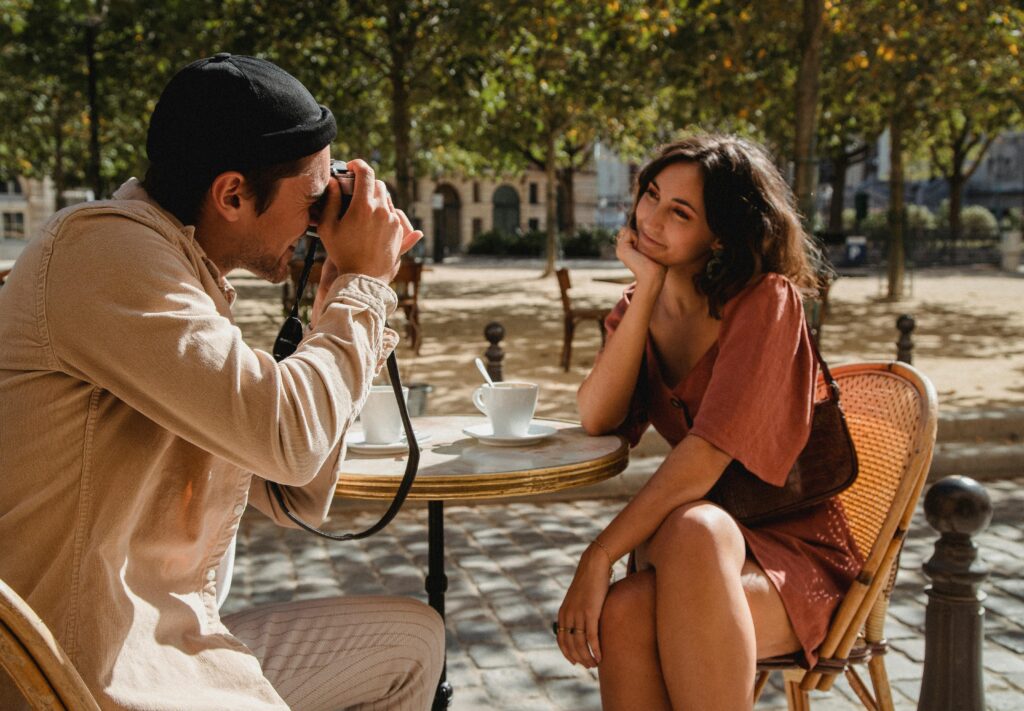 couple sitting together in cozy cafe coffee table
